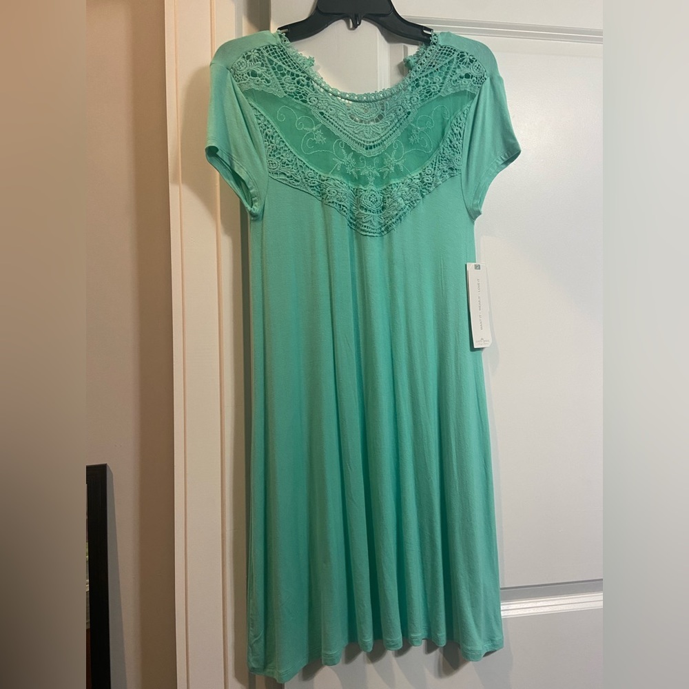 NWT Women’s small aqua colored dress. Super soft material.
